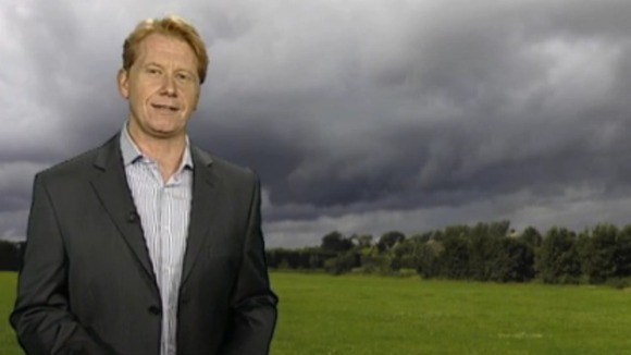 Simon Parkin in front of weather photo