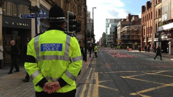A police officer from Wales at Deansgate Street in Manchester