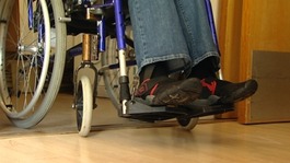 A person in a wheelchair.