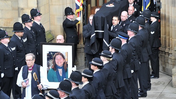 The coffin carrying the body of PC Fiona Bone is carried from the cathedral