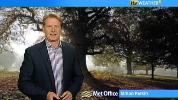 Simon Parkin in front of weather photo