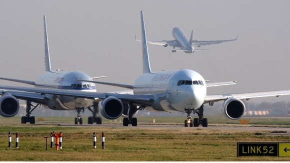 Planes queue to take off on the southern runway at Heathrow Airport