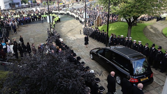 The funeral cortege of Pc Fiona Bone leaves Manchester Cathedral
