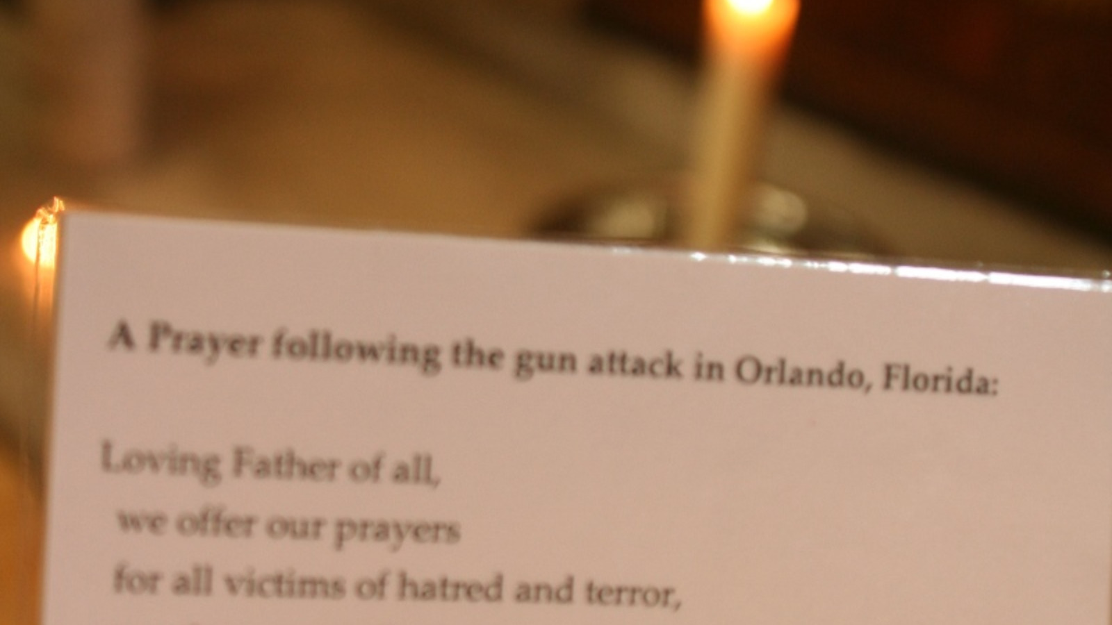 single candle burns for orlando in st anne s cathedral utv itv news