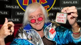 Sir Jimmy Saville in his iconic 'Jim'll Fix It' chair