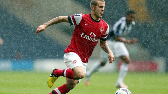 Wenger cautious over Wilshere