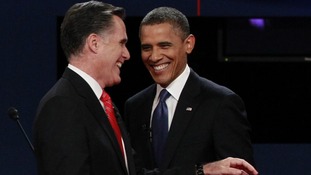 Barack Obama and Mitt Romney at the end of the first presidential debate