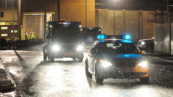 Police vehicles leave HMP Long Martin in Worcestershire