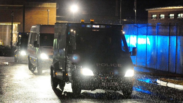 Police vehicles leave HMP Long Martin in Worcestershire