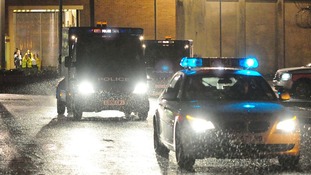 Police vehicles leave HMP Long Martin in Worcestershire