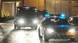 Police vehicles leave HMP Long Martin in Worcestershire