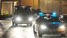 Police vehicles leave HMP Long Martin in Worcestershire