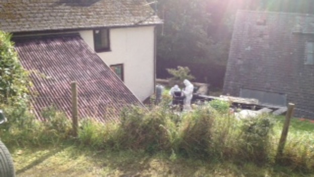 Forensic experts outside Mark Bridger's house in Machynlleth