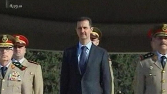 Syrian state TV showed President Assad making a rare public appearance