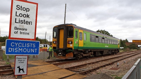 Train on pedestrian crossing