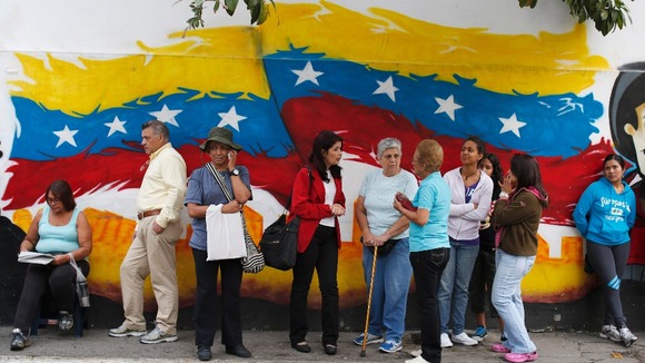 Chavez held a narrow lead in the polls as he bids to extend his term in power