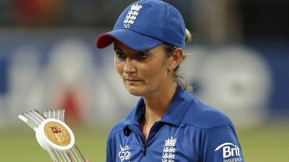 England's captain Charlotte Edwards walks away with the runner's up trophy after the ICC Women's Twenty20 Cricket World Cup final match in Colombo, Sri Lanka,