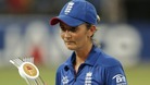 England's captain Charlotte Edwards walks away with the runner's up trophy after the ICC Women's Twenty20 Cricket World Cup final match in Colombo, Sri Lanka, 