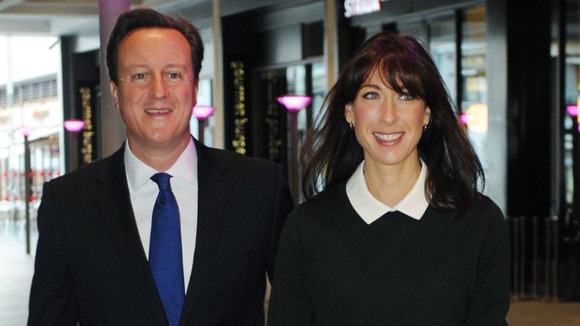Prime Minister David Cameron and his wife Samantha