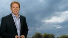 Simon Parkin in front of weather photo