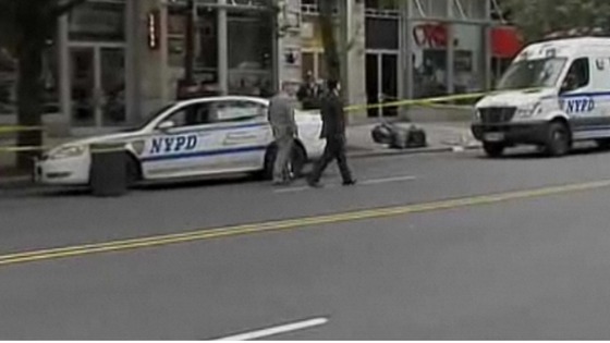 Investigators at the scene of Mike Jones' murder in New York.