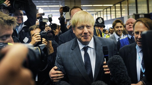 London Mayor Boris Johnson arrives at Birmingham New Street Station