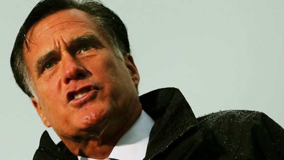 Republican presidential nominee Romney speaks during campaign rally in a downpour in Newport News