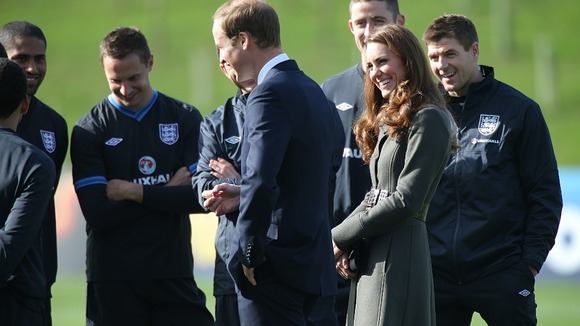Kate and William talking to members of England football team