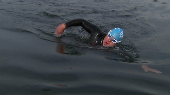 A soldier swimming.