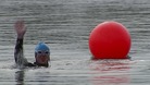 A soldier in the water.