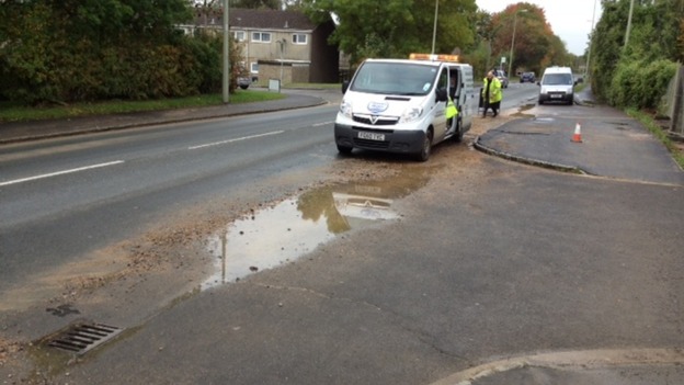 Thames Water engineers work on the burst pipe