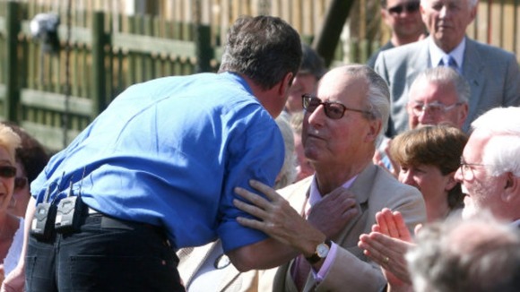 David Cameron greets his father Ian