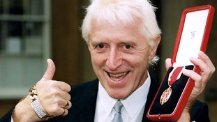 Sir Jimmy Savile after he received his knighthood f