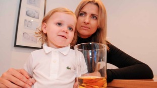 Sonny with his mother and a drink