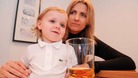 Sonny with his mother and a drink
