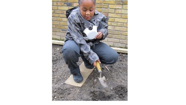 A child gardening.