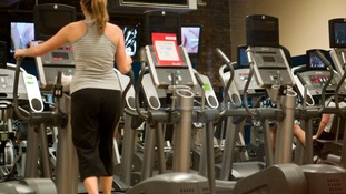 Woman excessing in gym