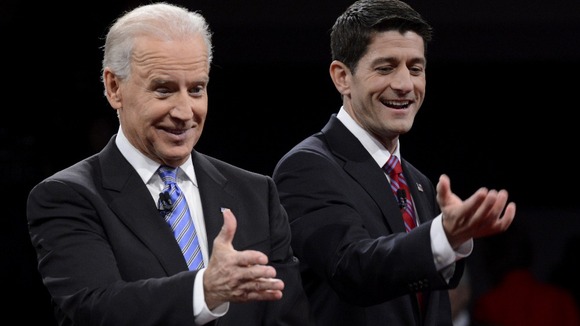 Vice President Biden and Republican vice presidential nominee Ryan react at the conclusion of the U.S. vice presidential debate in Danville