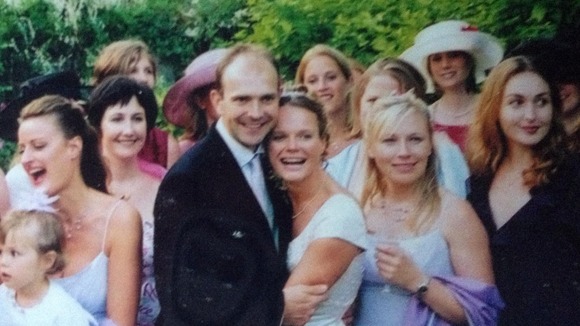 Dan Miller and Polly Brooks with friends on their wedding day.
