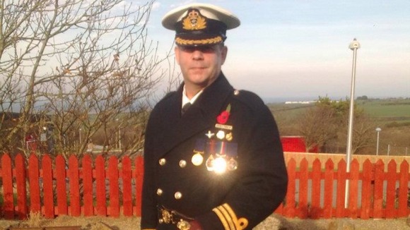 Brian Thomas in sea captain uniform
