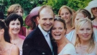 Dan Miller and Polly Brooks with friends on their wedding day.