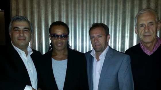 Edgar Davids with Barnet's Chairman Tony Kleanthous, incumbent Head Coach Mark Robson, and Director of Football Paul Fairclough.