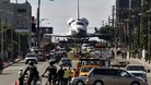 Space shuttle Endeavour is transported on Manchester Avenue in Los Angeles, California.