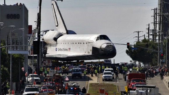 The space shuttle is carefully manoeuvred through Los Angeles.