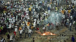  Senegalese football fans light fires at the Leopold Sedar Senghor stadium in Dakar.