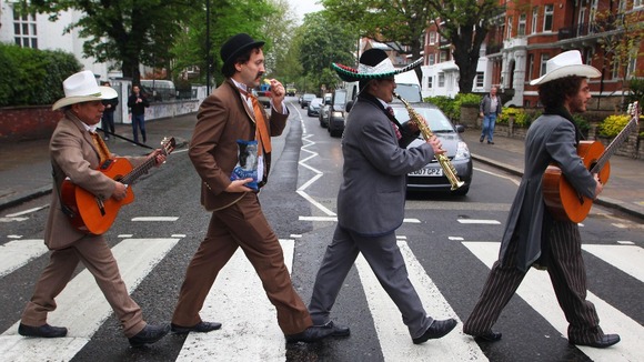 A Mexican Mariachi band takes its turn to re-create the famous picture.