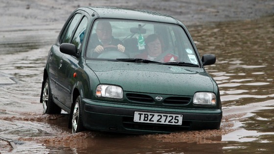 Car in puddle