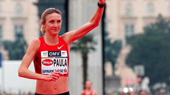 Marathon world record-holder Paula Radcliffe reacts after crossing the finish line at the Vienna city half marathon