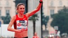 Marathon world record-holder Paula Radcliffe reacts after crossing the finish line at the Vienna city half marathon