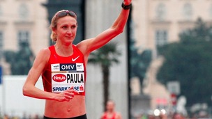 Marathon world record-holder Paula Radcliffe reacts after crossing the finish line at the Vienna city half marathon